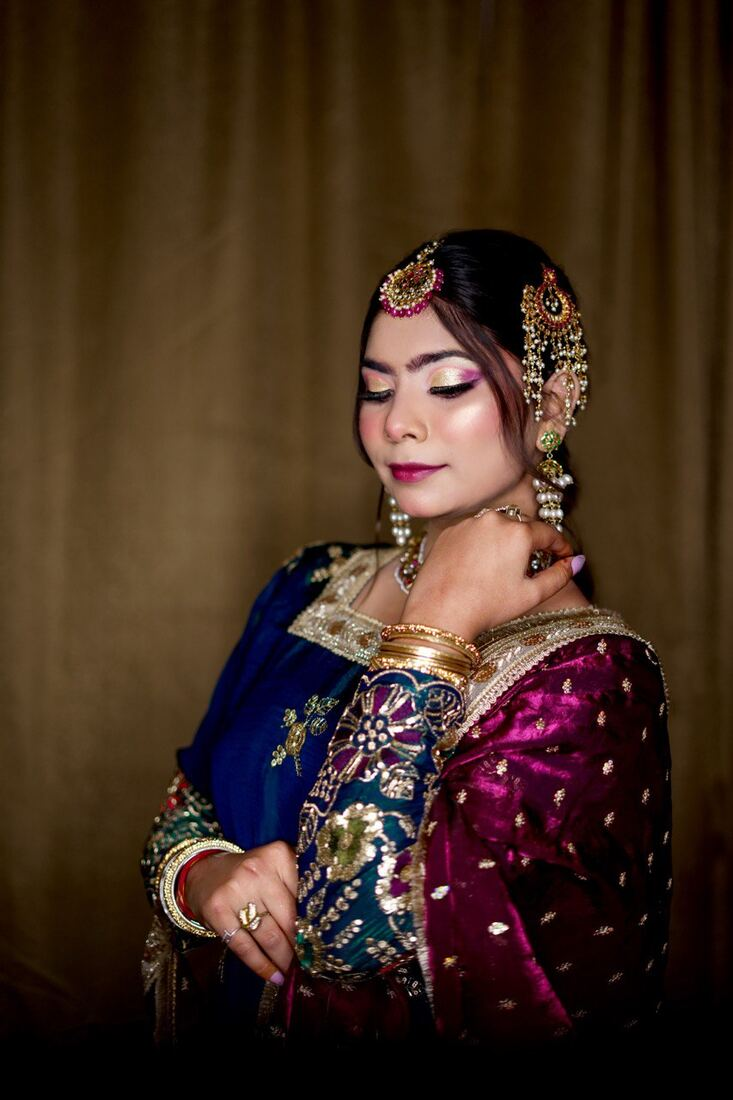 Blue and maroon bridal makeup